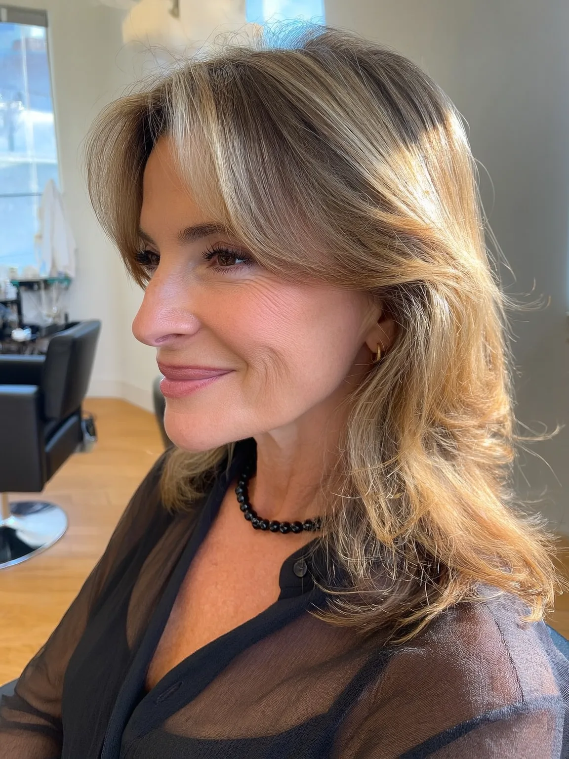 Shoulder-Length Layered Cut with Golden Blonde Balayage